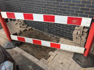 The hole filled but paving blocks not replaced.